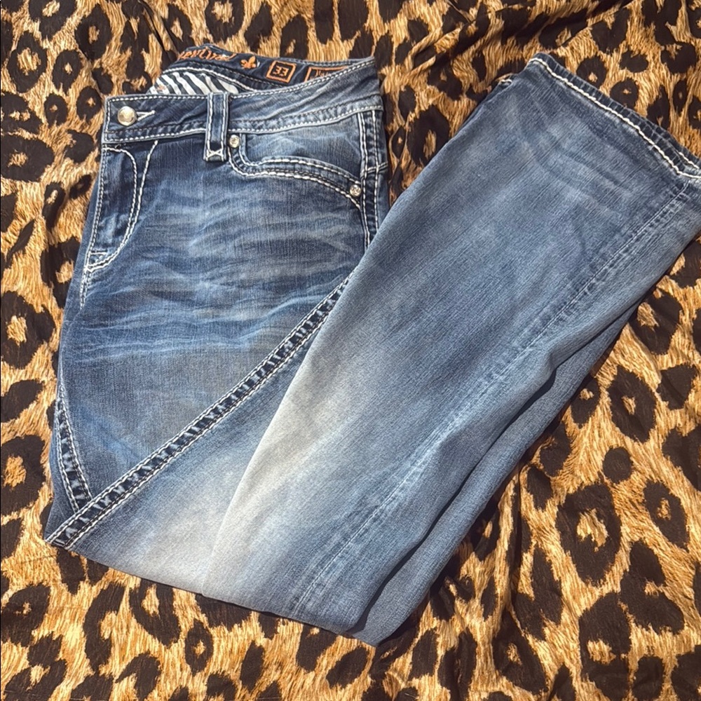 Rock Revival Blue Boot Cut Jeans with Decorative Stitching